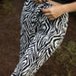 Pantalon zebra con correa