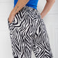 Pantalon zebra con correa